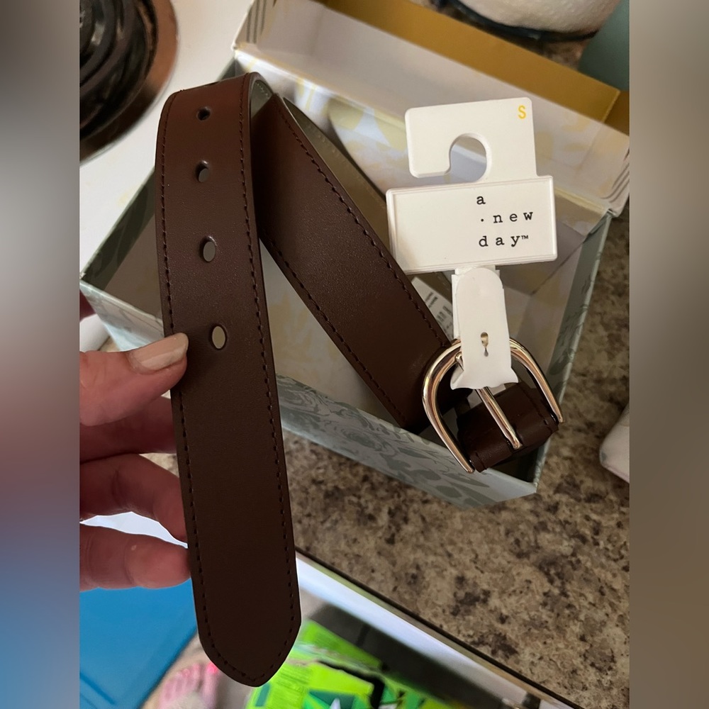 a • new day brown belt